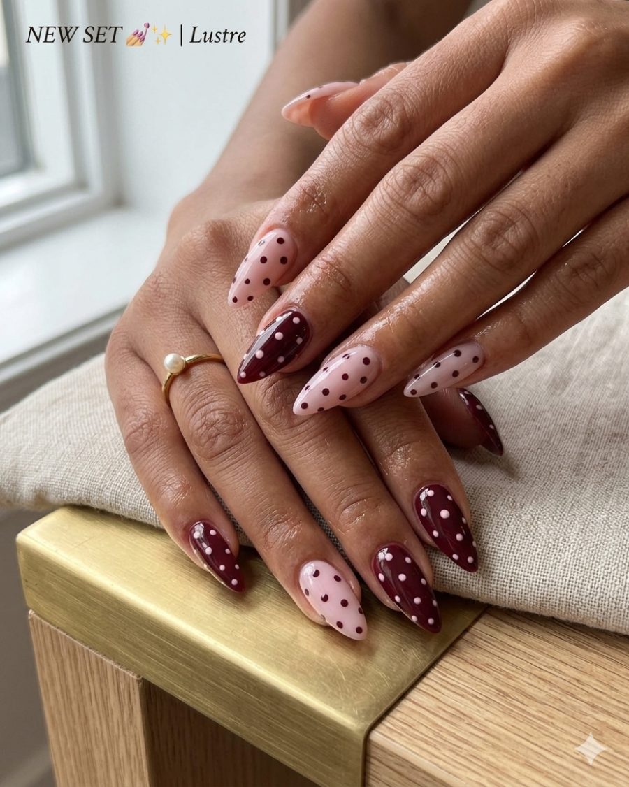 Burgundy polka dot almond nails