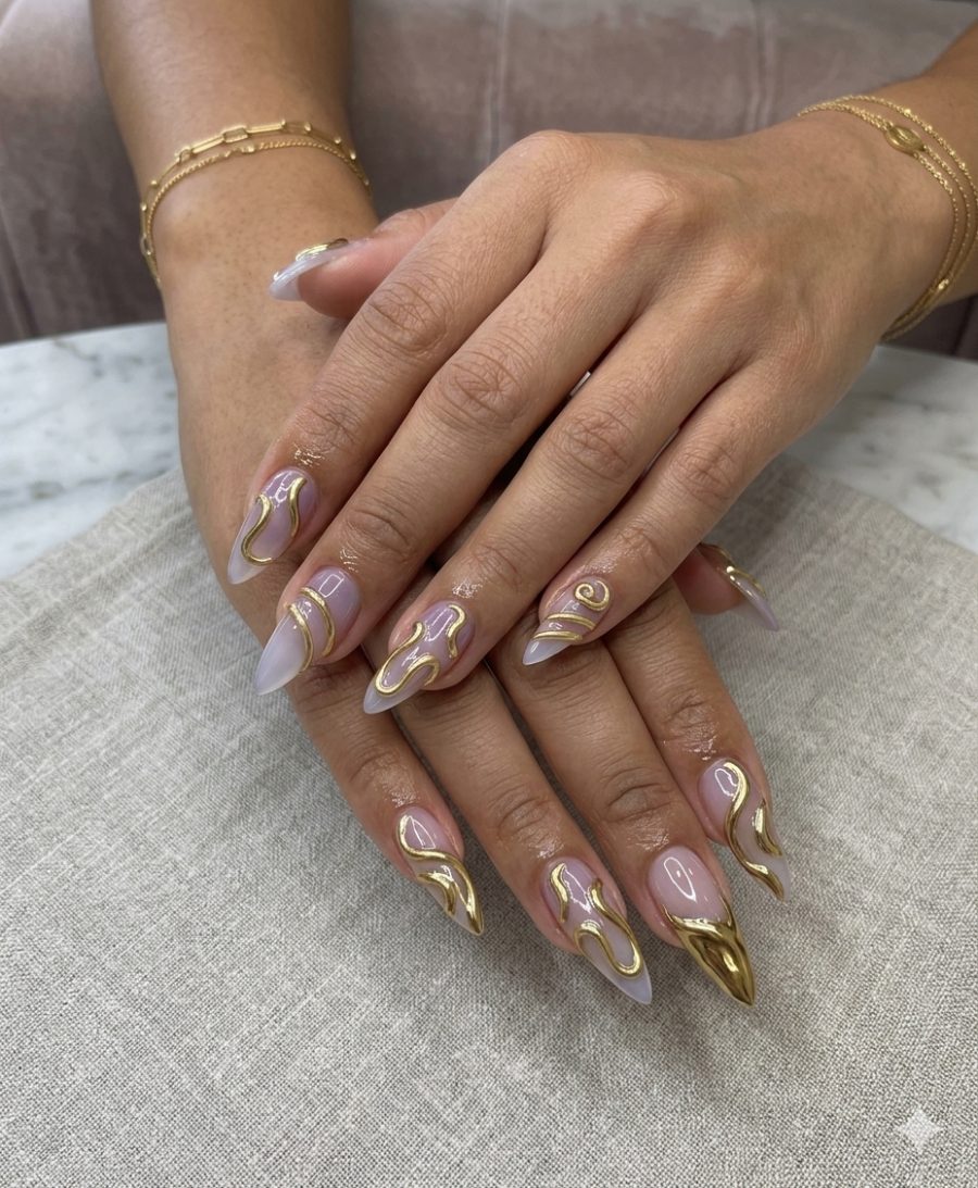 Gold swirl nail art